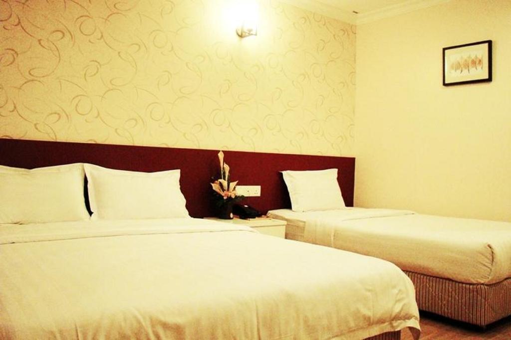 Adel Hotel Putatan Quarto foto
